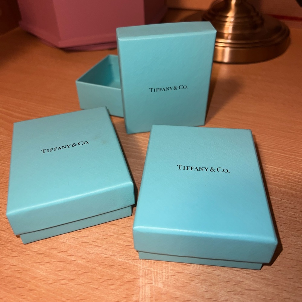 Three Tiffany empty boxes and two bags